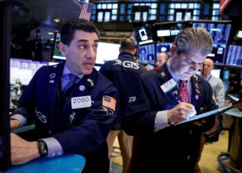 Wall Road in measured temper as Biden bows out