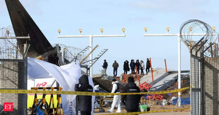 Empty desks and tears mark 5 colleagues killed in South Korean aircraft crash