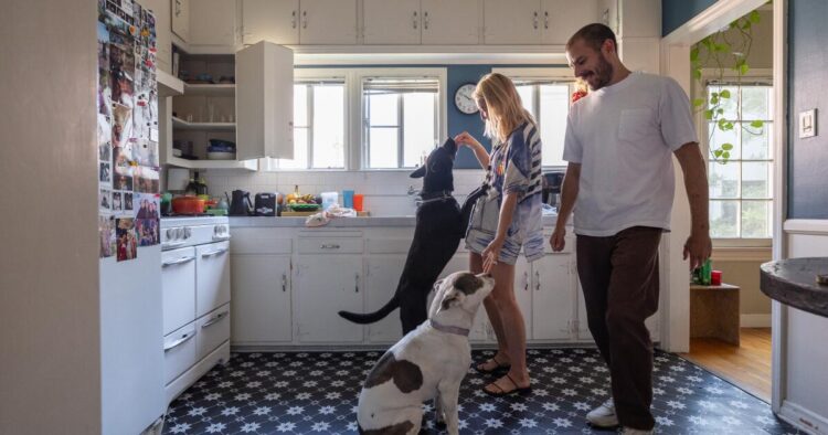 A pair rework their residence with artwork and thrifted furnishings