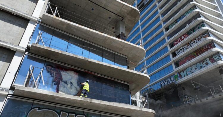 Graffiti towers cleanup begins – Los Angeles Instances